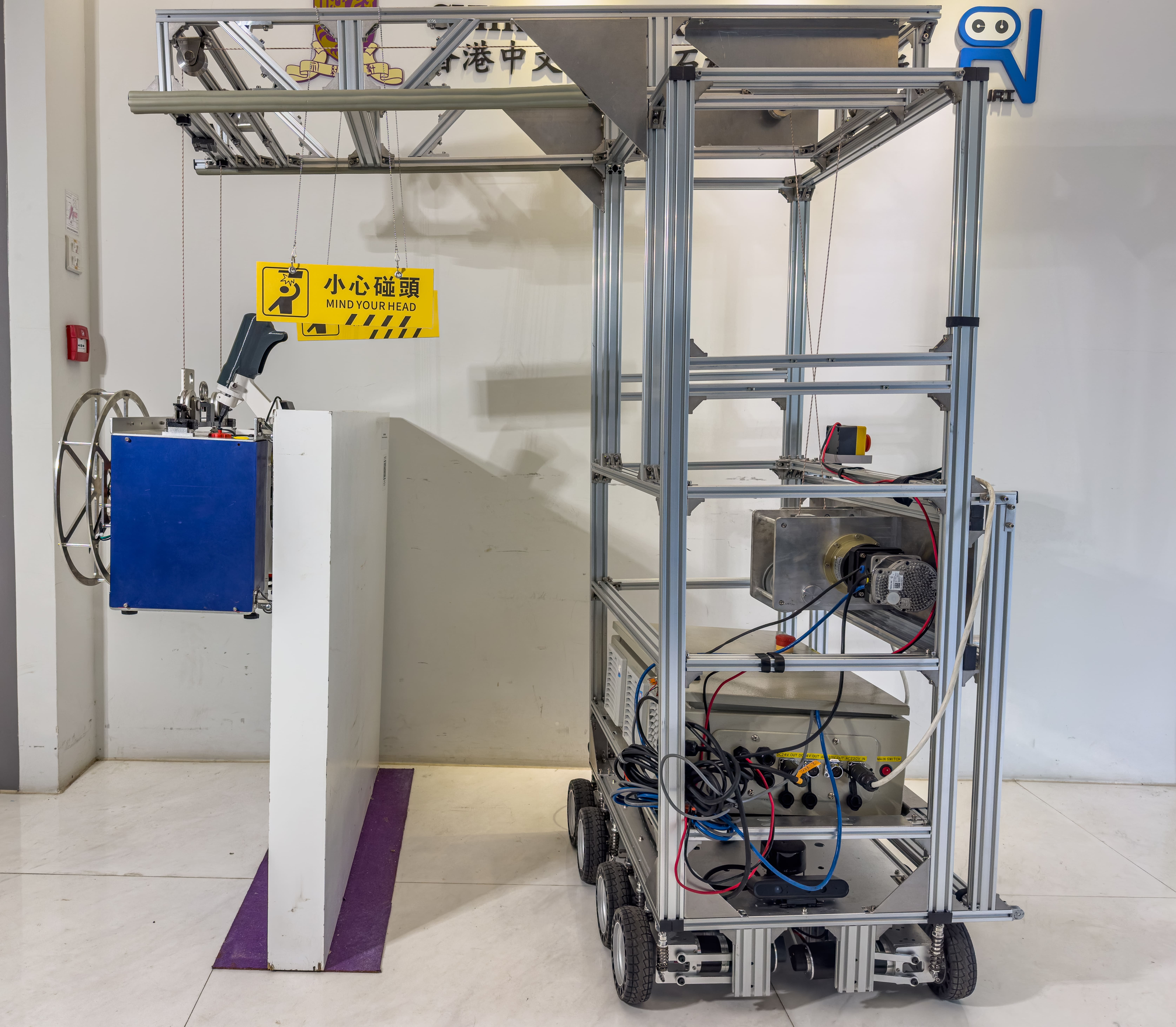 Robo Tapper：由缆绳驱动检查机器人，用于高层建筑外墙表面的检查